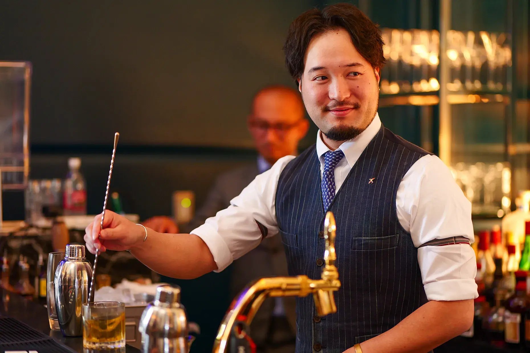 Atsushi preparing a Mai Tai