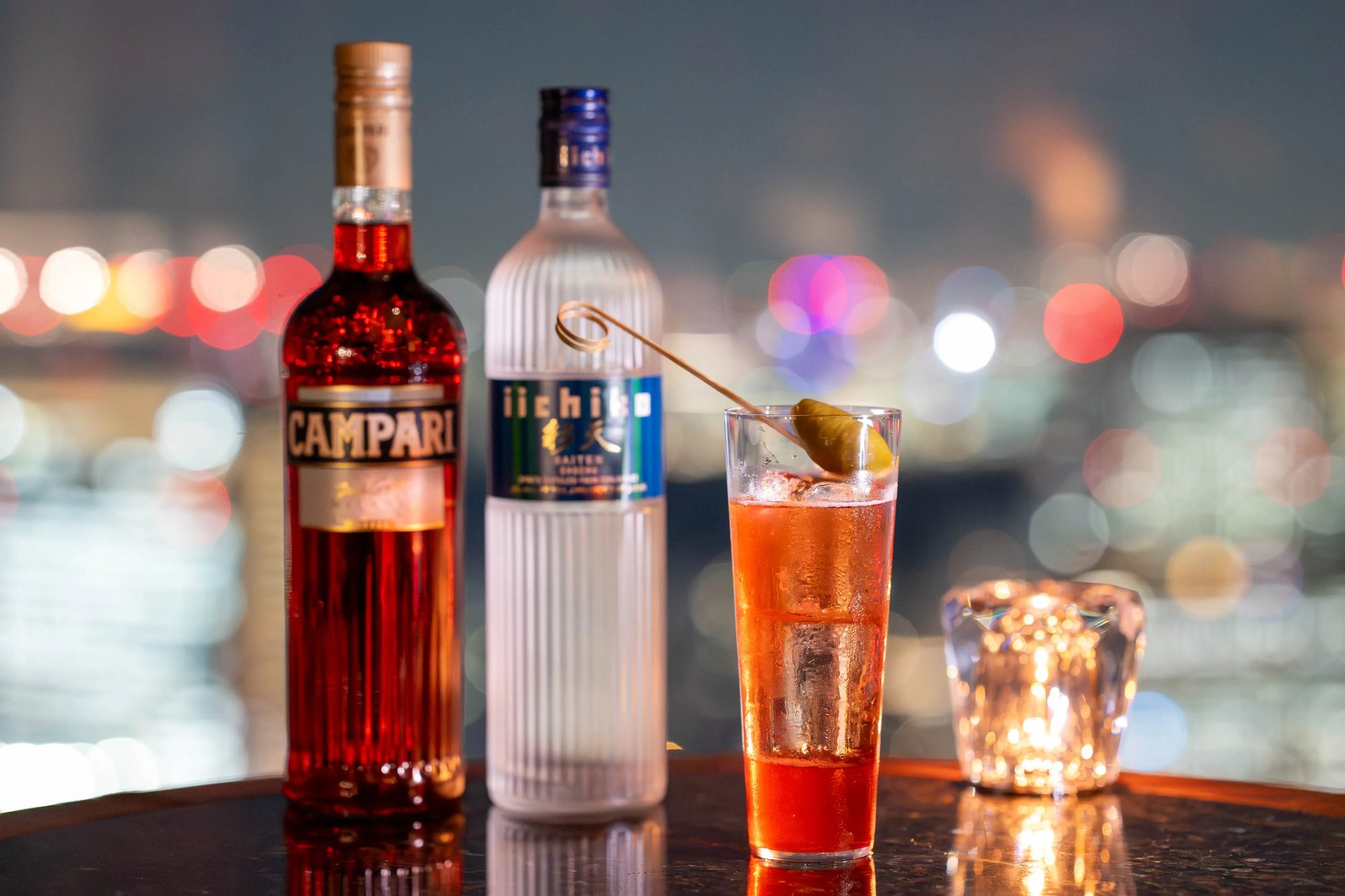 Naoto Ogawa’s Between the Calm and Passion — made with iichiko Saiten, Campari, sapin, jasmine tea, and soda